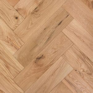 Baddiley Oak Herringbone engineered wood flooring showing a natural smooth oiled finish in a parquet pattern.