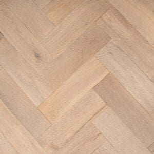 Barbridge Oak Herringbone engineered wood flooring in a smoked white brushed grey oiled finish