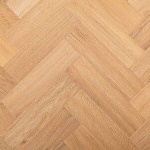 Beeston Oak Herringbone engineered wood flooring showing a natural brushed and lacquered finish in a parquet pattern.