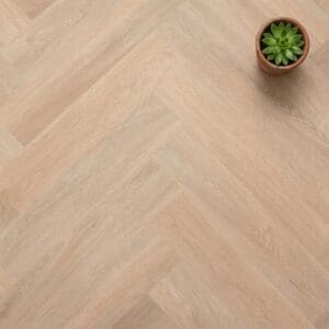 Blenheim Oak Herringbone luxury vinyl flooring close-up texture - photorealistic room shot