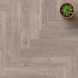 Brampton Chase Studio Designs Herringbone County Oak luxury vinyl flooring close-up texture - photorealistic room shot