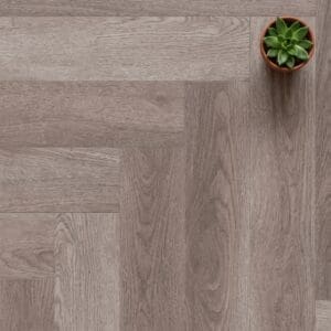 Brampton Chase Studio Designs Herringbone Heather Grey luxury vinyl flooring close-up texture - photorealistic room shot