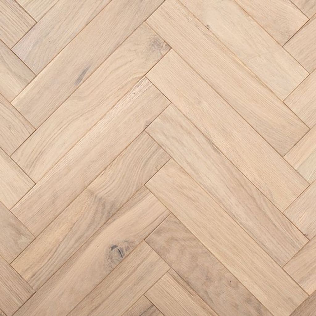 Bulkeley oak herringbone engineered wood flooring with white smoked oiled finish in a parquet pattern