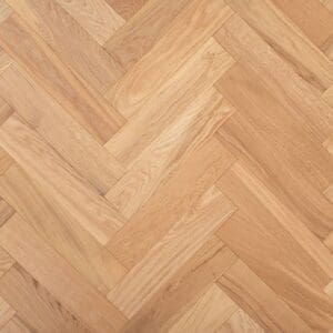 Dodleston Oak Herringbone engineered wood flooring showing a natural brushed and lacquered finish in a parquet pattern.