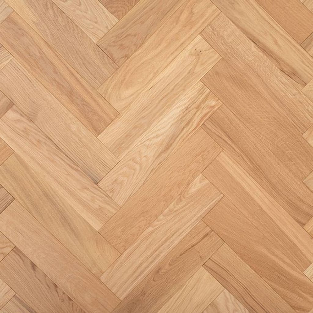 Dodleston Oak Herringbone engineered wood flooring showing a natural brushed and lacquered finish in a parquet pattern.