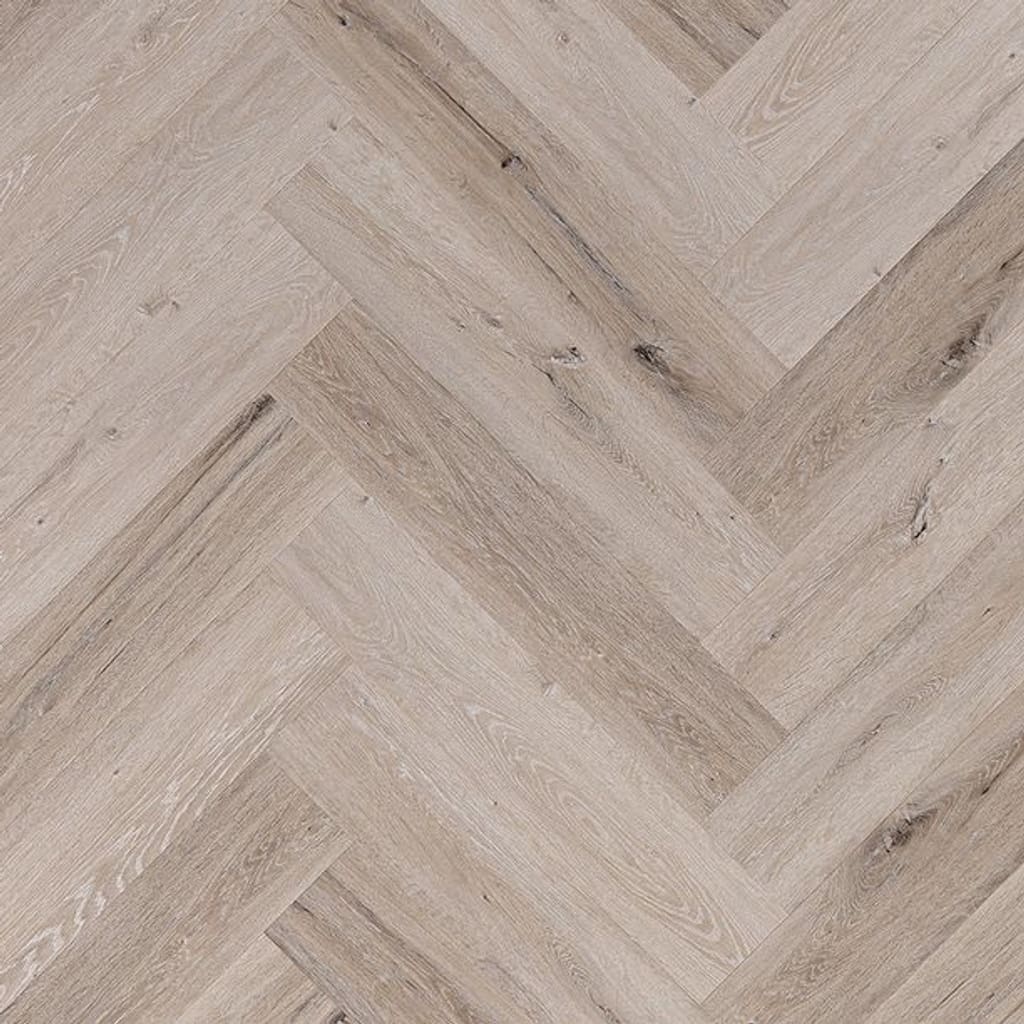 Dormy Oak Herringbone whitewashed grey oak SPC flooring sample in a parquet pattern