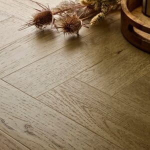 Elements Inspirations Classic Oak Herringbone EIH09 luxury vinyl flooring detail with tray and dried flowers