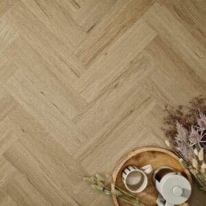 Elements Inspirations Classic Oak Herringbone EIH09 luxury vinyl flooring with tray and dried flowers.