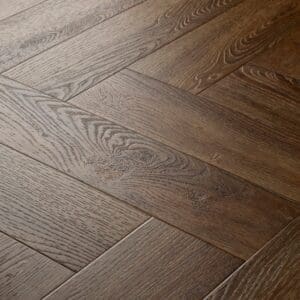 Elements Inspirations Espresso Herringbone EIH02 flooring detail showing the wood grain and herringbone pattern.