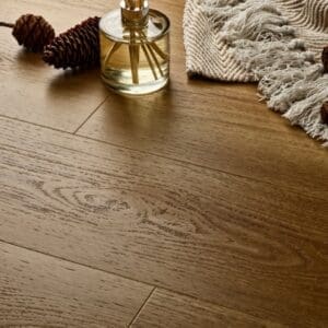 Elements Inspirations Golden Oak Plank EIP12 installed floor with diffuser and pinecones