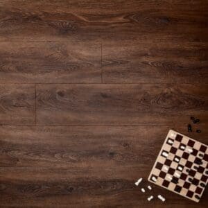 Elements Inspirations Mahogony Plank EIP06 luxury vinyl flooring with chess board and pieces.