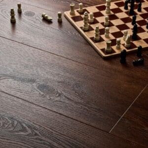 Elements Inspirations Mahogony Plank EIP06 flooring with a chess board and pieces