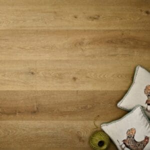Elements Inspirations Natural Oak Plank EIP05 installed floor with pillows and yarn