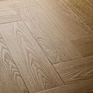 Elements Inspirations Sandy Oak Herringbone EIH01 luxury vinyl flooring close-up showing wood grain detail