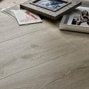 Elements Inspirations White Ash Plank EIP11 installed floor with family photos and picture frames