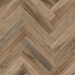 Golden brown oak effect herringbone SPC flooring sample showing wood grain texture