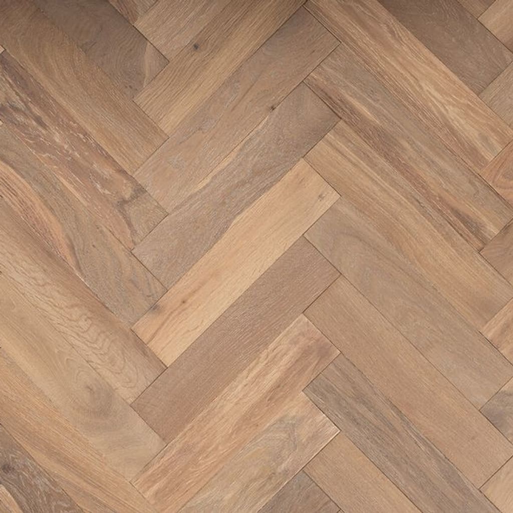 Frodsham oak herringbone engineered wood flooring with a smoked and brushed oiled finish in a traditional parquet pattern.