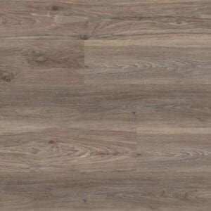 Overhead view of Thyme Oak rigid core SPC flooring planks showing antique brown wood grain and knots