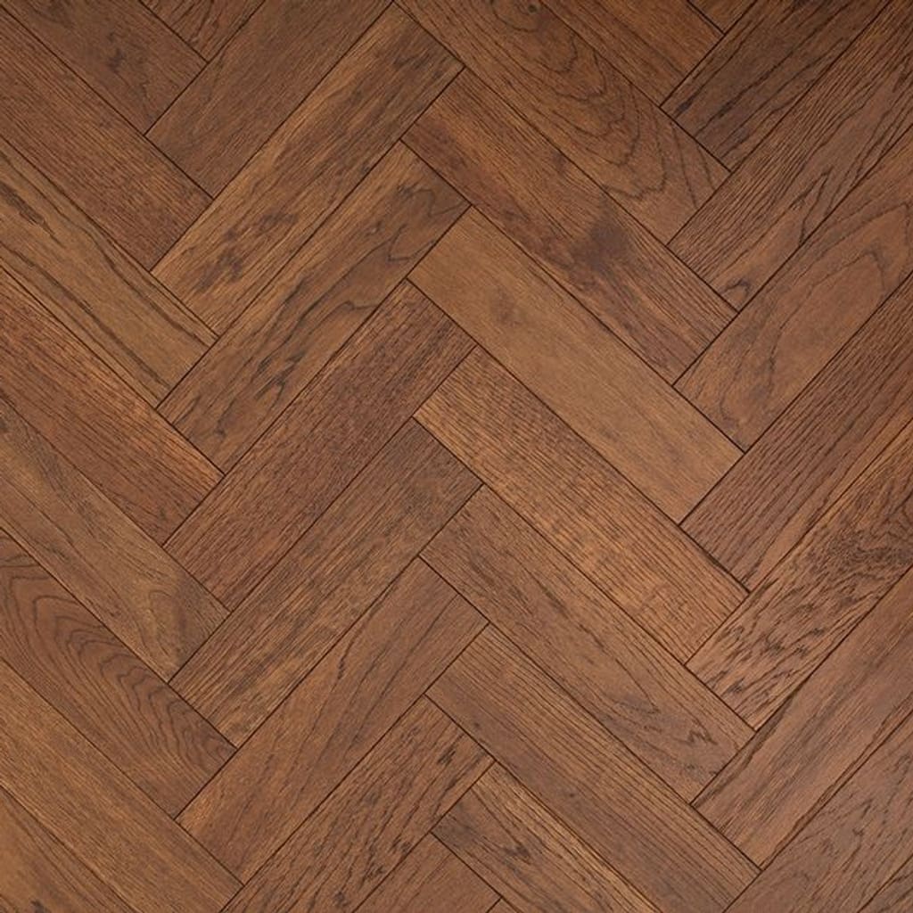 Overhead view of Hale Oak Herringbone engineered wood flooring showing the golden oak tones and parquet pattern.
