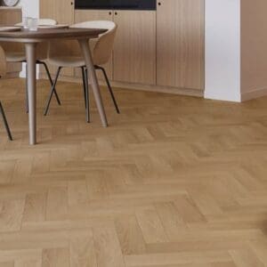 Top down view of Invictus Ultimus Velvet Oak Parquet Constance sample showing herringbone orientation