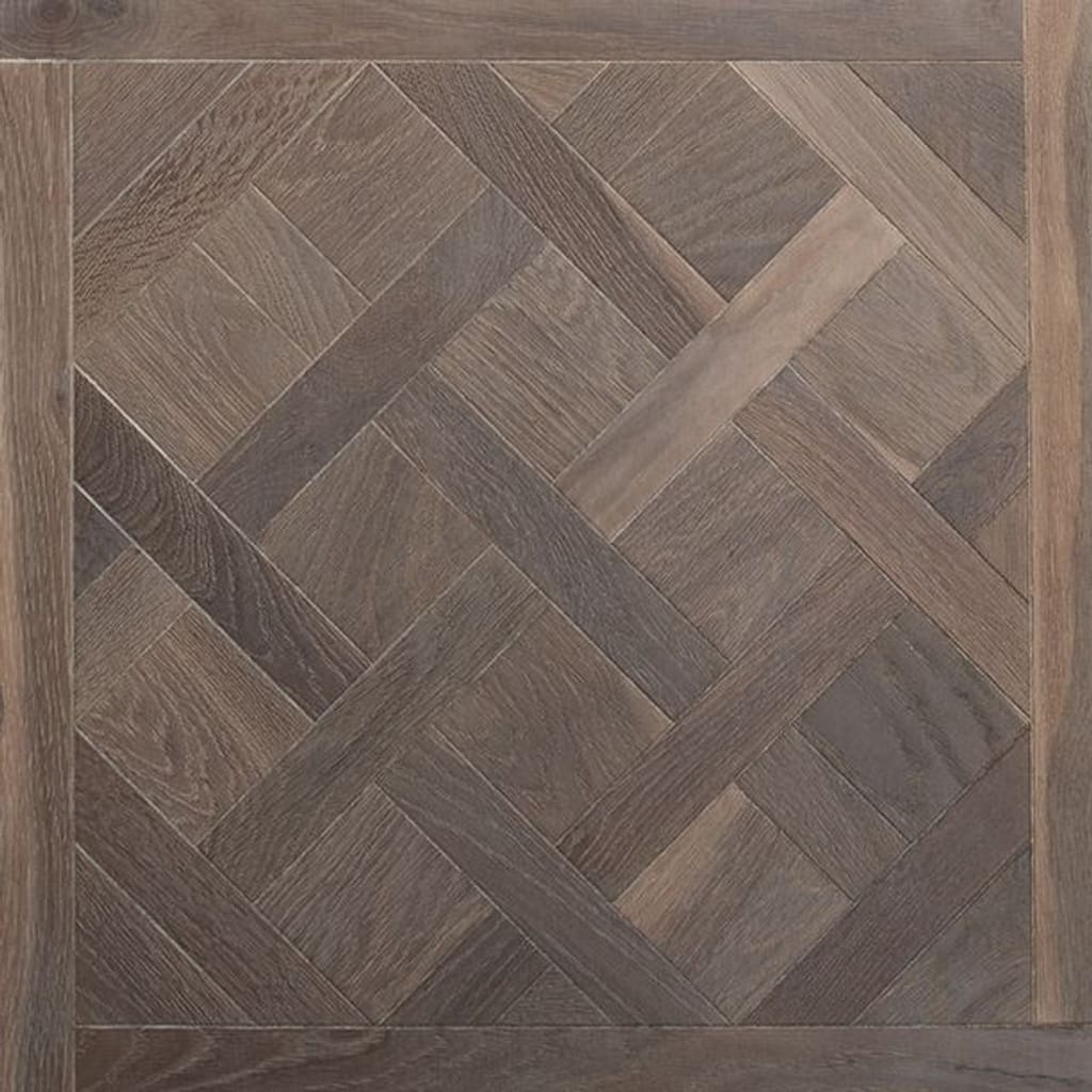 Grey brushed and oiled oak Versailles panel engineered wood flooring sample.