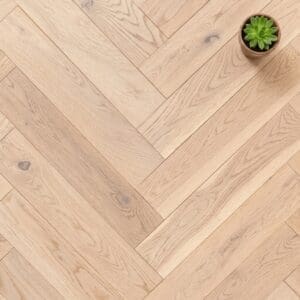 Prestbury Oak Herringbone engineered oak flooring close-up texture - photorealistic room shot