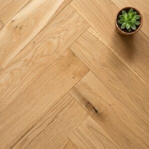 Ridley Oak Herringbone engineered oak flooring close-up texture - photorealistic room shot