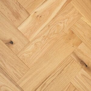 Natural brushed and oiled oak engineered wood flooring in a herringbone pattern