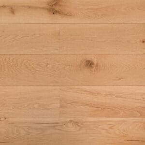 A top-down view of Roodee Oak engineered wood planks showing natural grain and knots with a smooth lacquered finish.