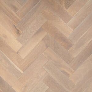 Grey smoked brushed lacquered oak herringbone engineered wood flooring in a parquet pattern