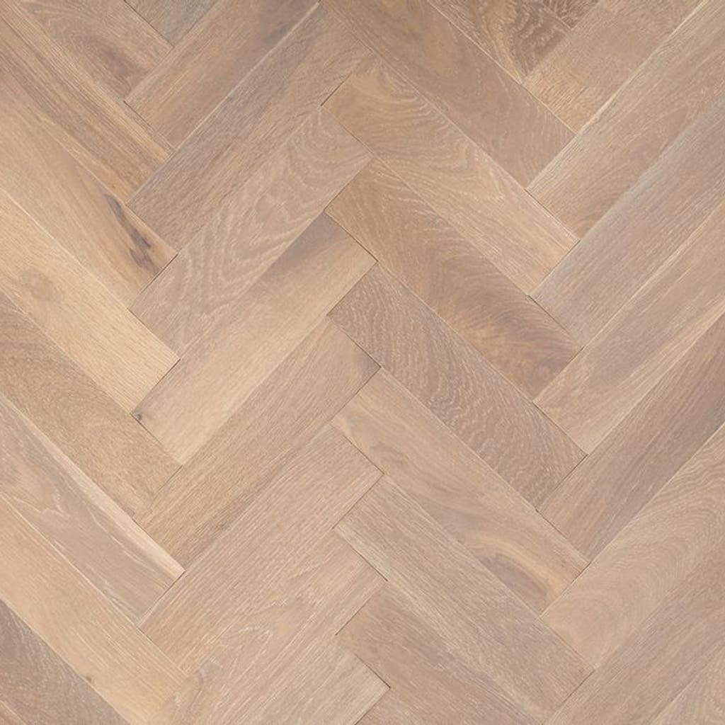 Grey smoked brushed lacquered oak herringbone engineered wood flooring in a parquet pattern
