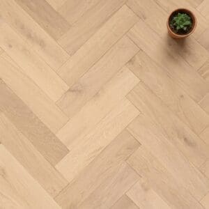Tarporley Oak Herringbone engineered oak flooring close-up texture - photorealistic room shot