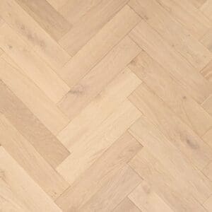 Overhead view of Tarporley Oak herringbone engineered wood flooring with a smooth invisible oiled finish