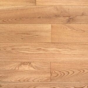 A top down view of Tatton Park Oak engineered wood flooring planks showing natural grain and knots.