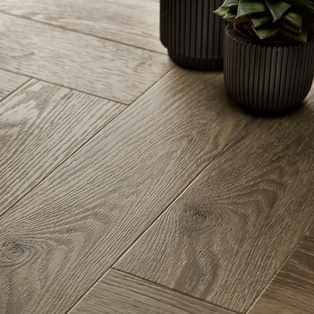 Textures LVT Ash Herringbone TH08 flooring detail showing wood grain and plank installation