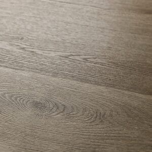 Close up of Textures LVT Ash Plank TP08 luxury vinyl flooring showing wood grain detail.