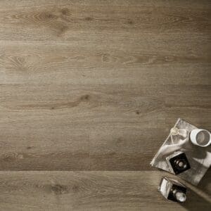Textures LVT Ash Plank TP08 installed floor with coffee cup and bottles