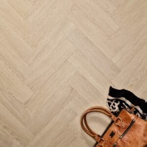 Textures LVT Blonde Oak Herringbone TH09 flooring with handbag and scarf