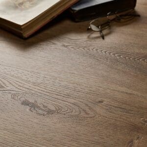Textures LVT Distressed Oak Plank TP06 flooring detail with books and glasses