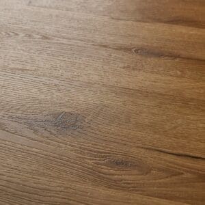 Textures LVT Honey Oak Plank TP07 close-up showing wood grain texture and knot details.