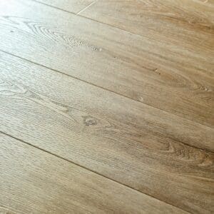 Close-up of Textures LVT Washed Oak Plank TP04 luxury vinyl flooring showing wood grain detail.