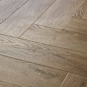 Textures LVT Weathered Oak Herringbone TH05 flooring close-up showing wood grain detail
