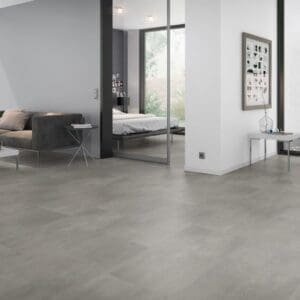 Modern living room interior featuring Cement Natural stone effect flooring