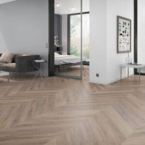 Modern living room featuring Cerused Oak Dark Natural Chevron flooring with contemporary furniture