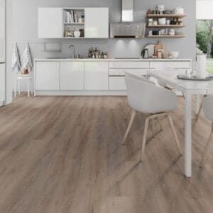 Cerused Oak Dark Natural flooring installed in a modern white kitchen with dining area