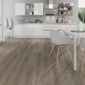 Bright modern kitchen and dining area with Cerused Oak Light Natural vinyl flooring.