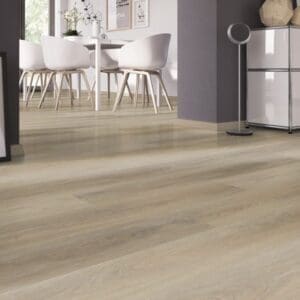 French Oak Natural vinyl flooring in a bright dining room with white chairs