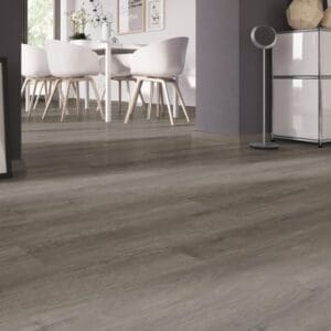 Spacious living area featuring Manor Oak Natural Dark glue down vinyl planks.