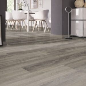 Contemporary dining area with grey wood effect vinyl flooring