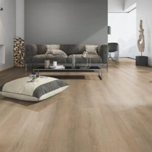 Modern living room setting featuring Sawcut Oak Dark flooring with a grey sofa and minimalist decor.